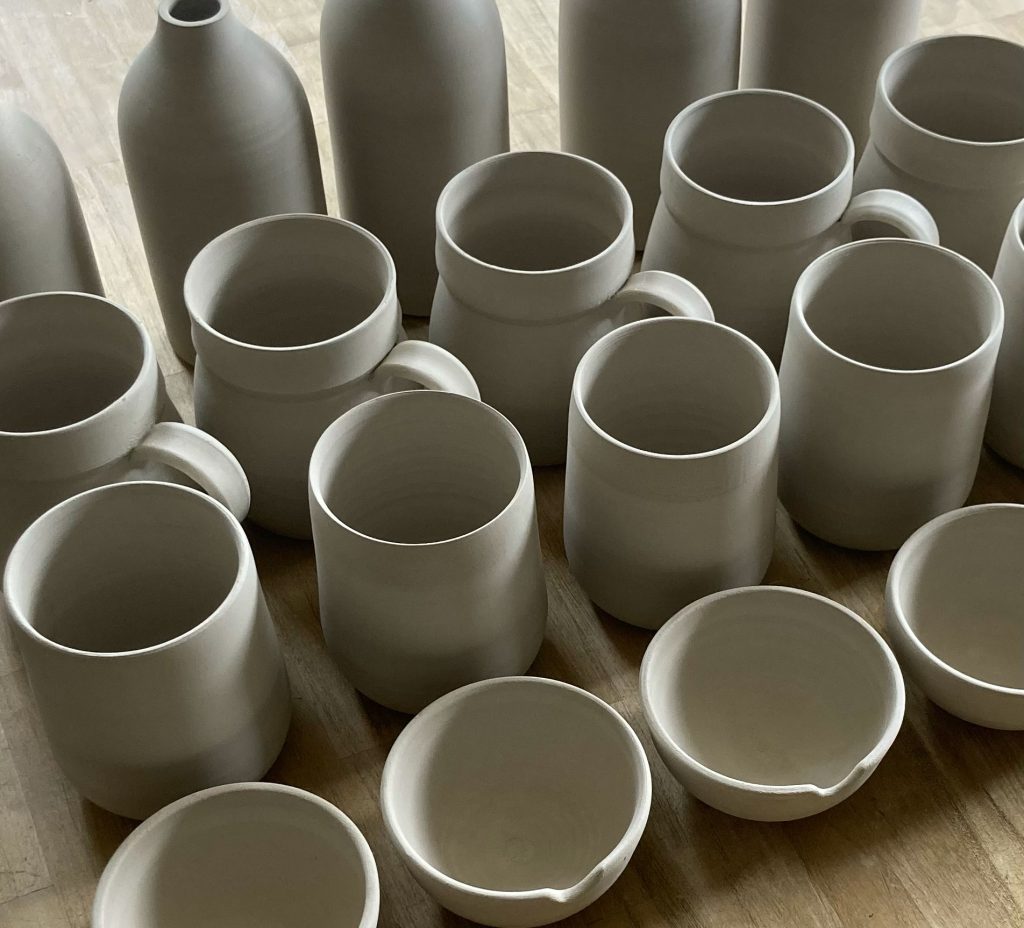 bone dry pottery, mugs, cups and oil pourers